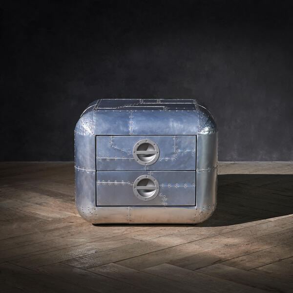 An aluminium Aviator side table inspired by two different military aircraft, melded together in one cool design.