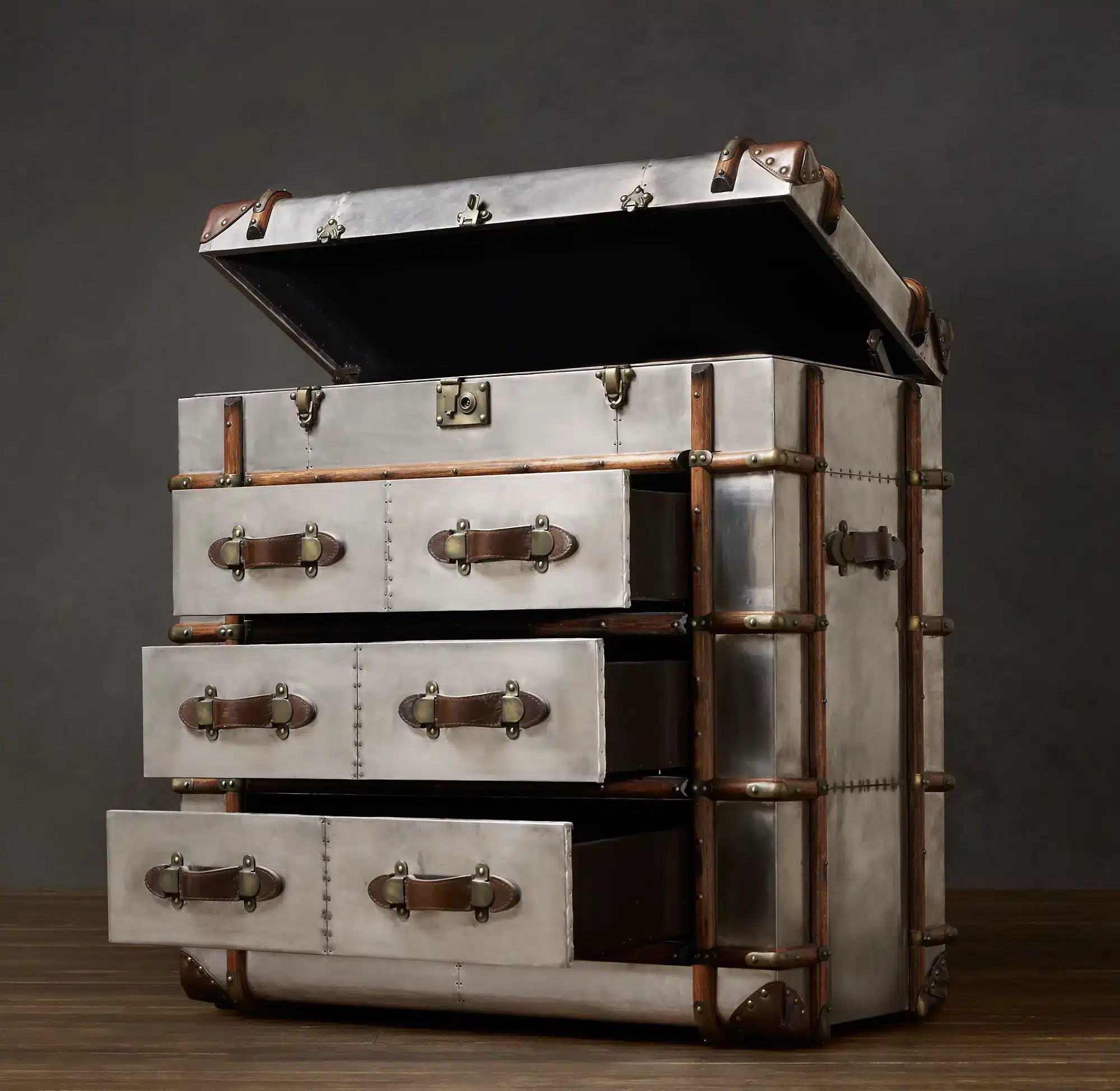 The Aviator chest is inspired by a worn, custom-made steamer Trunk.