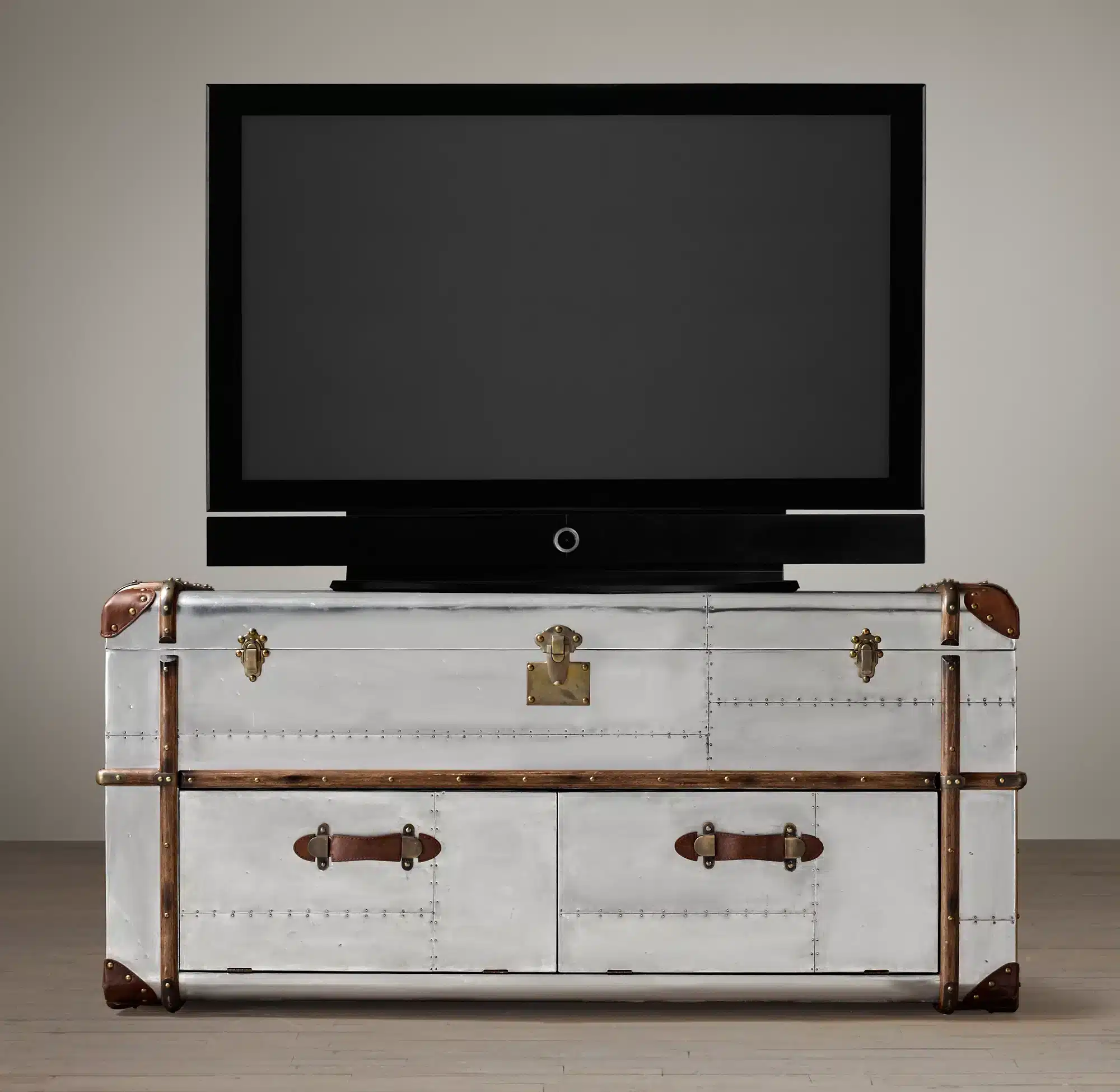 The Richard Trunk tv cabinet is inspired by a worn, custom-made steamer Trunk.
