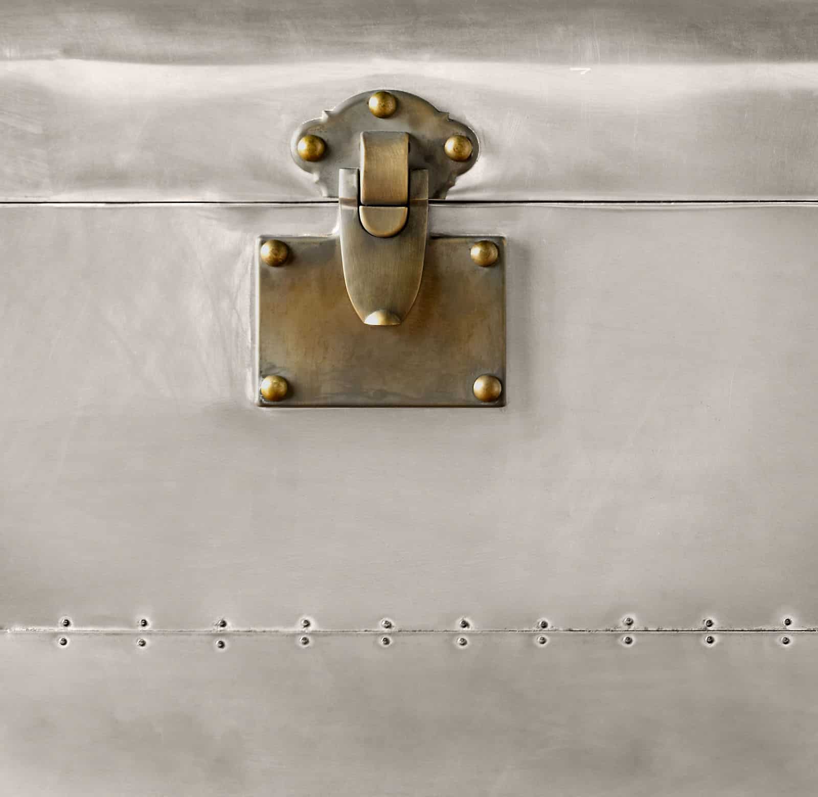 The messing lock of an Aviator trunk cabinet design