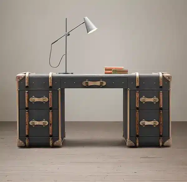 The Richards' Trunk desk is inspired by a worn, custom-made steamer trunk.